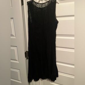 Black dress with sheer overlay